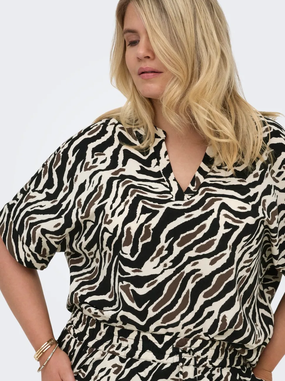 CARELITE Blusa