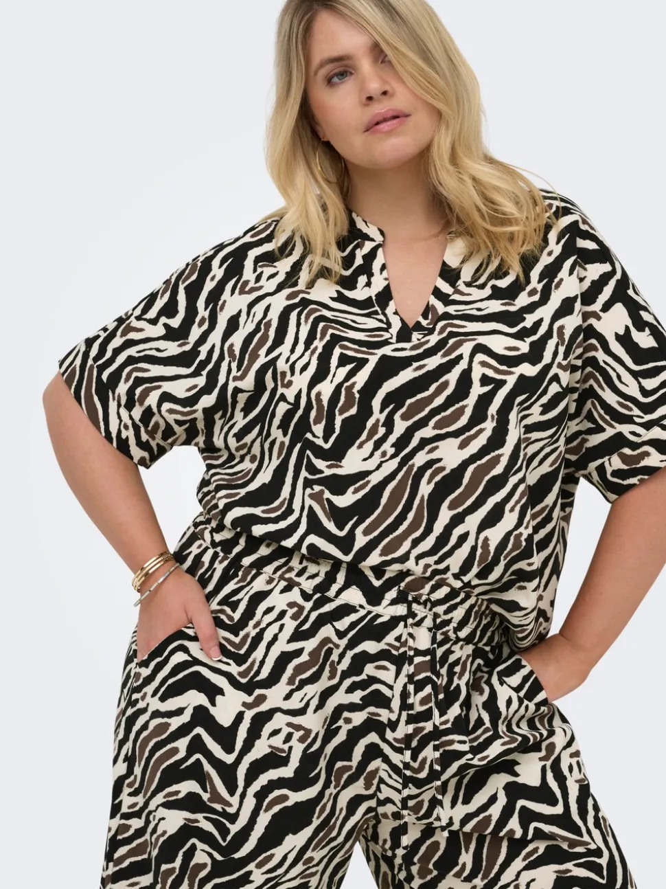 CARELITE Blusa